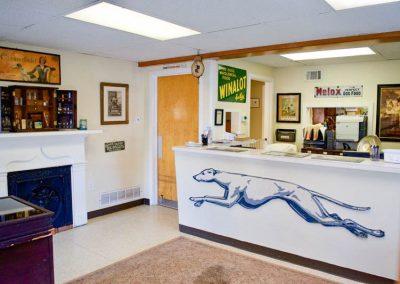 Reception Desk with Antique Greyhound Bus Sign