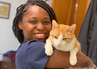 Ayanna, with one of our hospital cats, Tyler