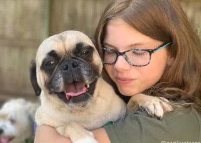 Kennel Assistant Katie with a boarding dog