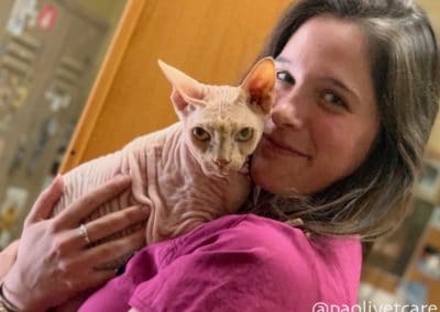 Receptionist Theresa with one of our hospital cats