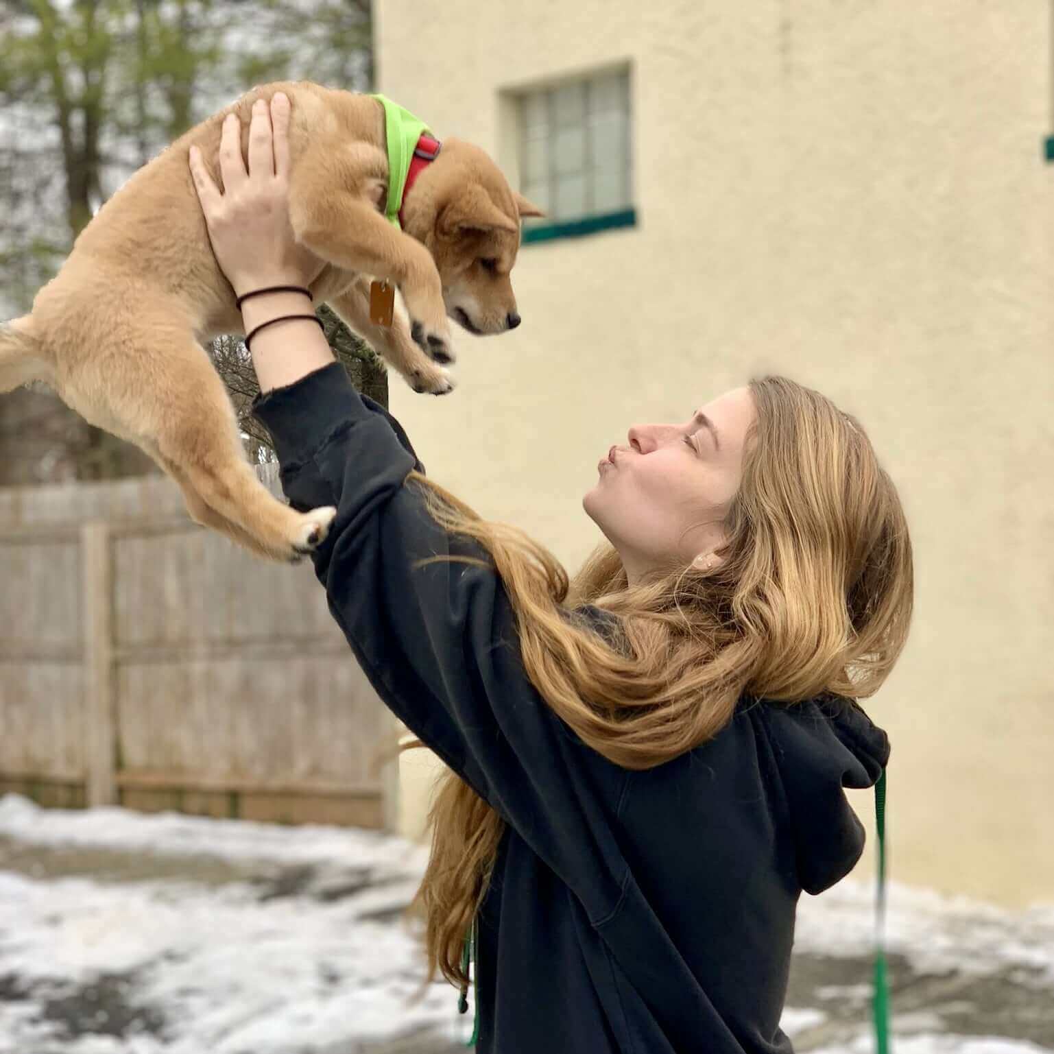 Kimberly and a boarding puppy Kimberly Kennel Assistant